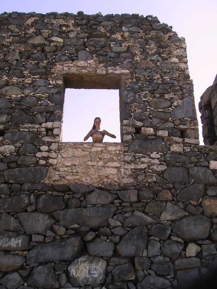 20P MILF Lori Anderson in a bikini in an abandoned building shows her tiny tits