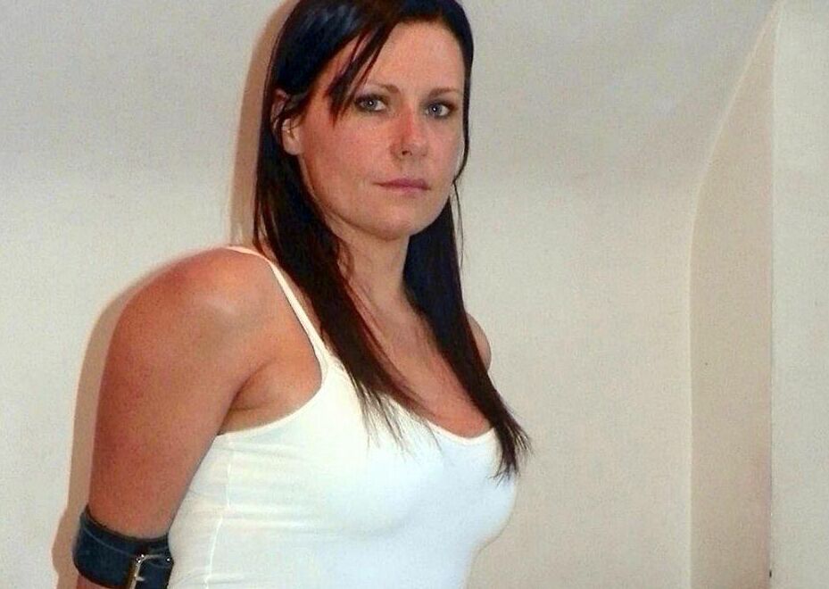 16P Solo girl is cleave gagged and hogtied on a bed in denim cutoffs