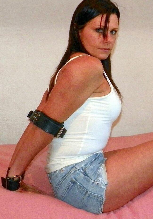 16P Solo girl is cleave gagged and hogtied on a bed in denim cutoffs