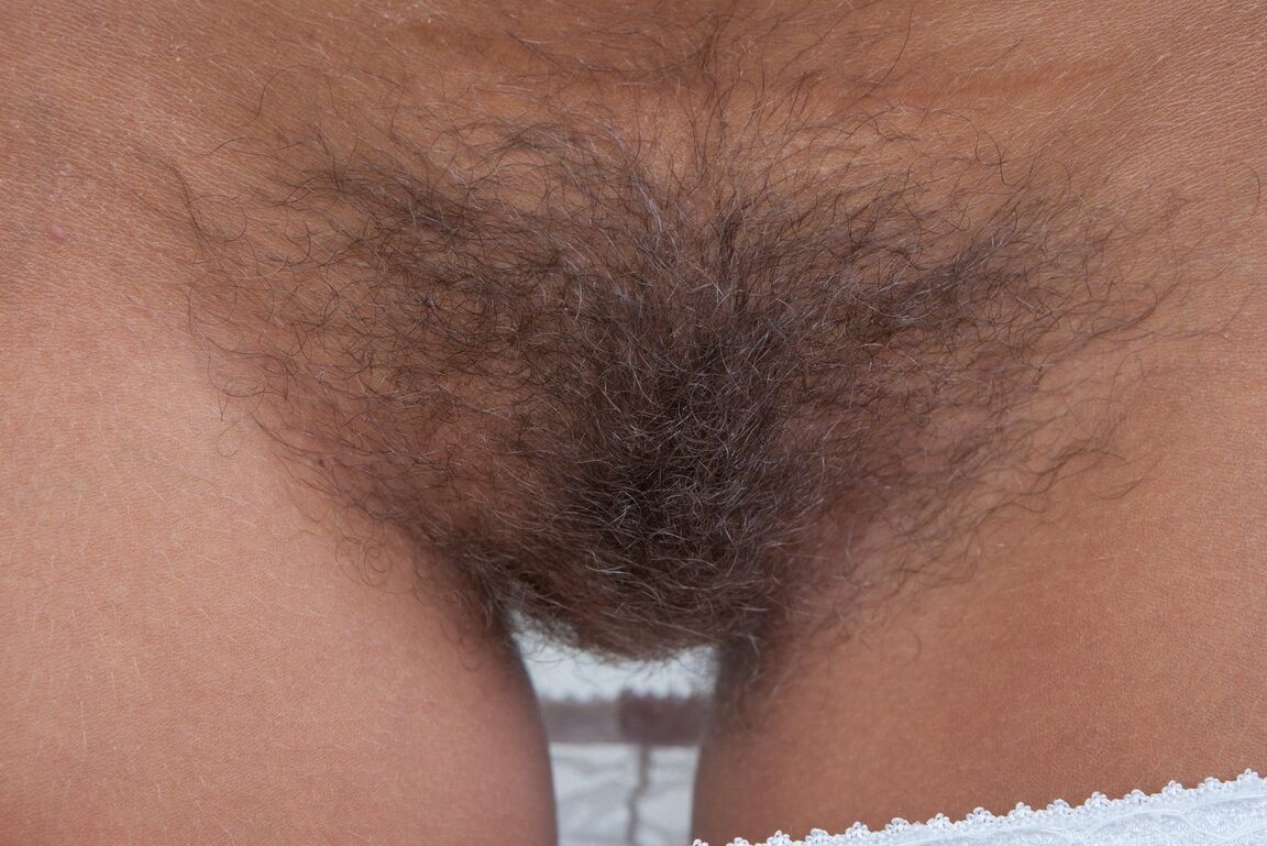 16P Hirsuite Promesita spreads her legs to play peek-a-boo with her hairy twat