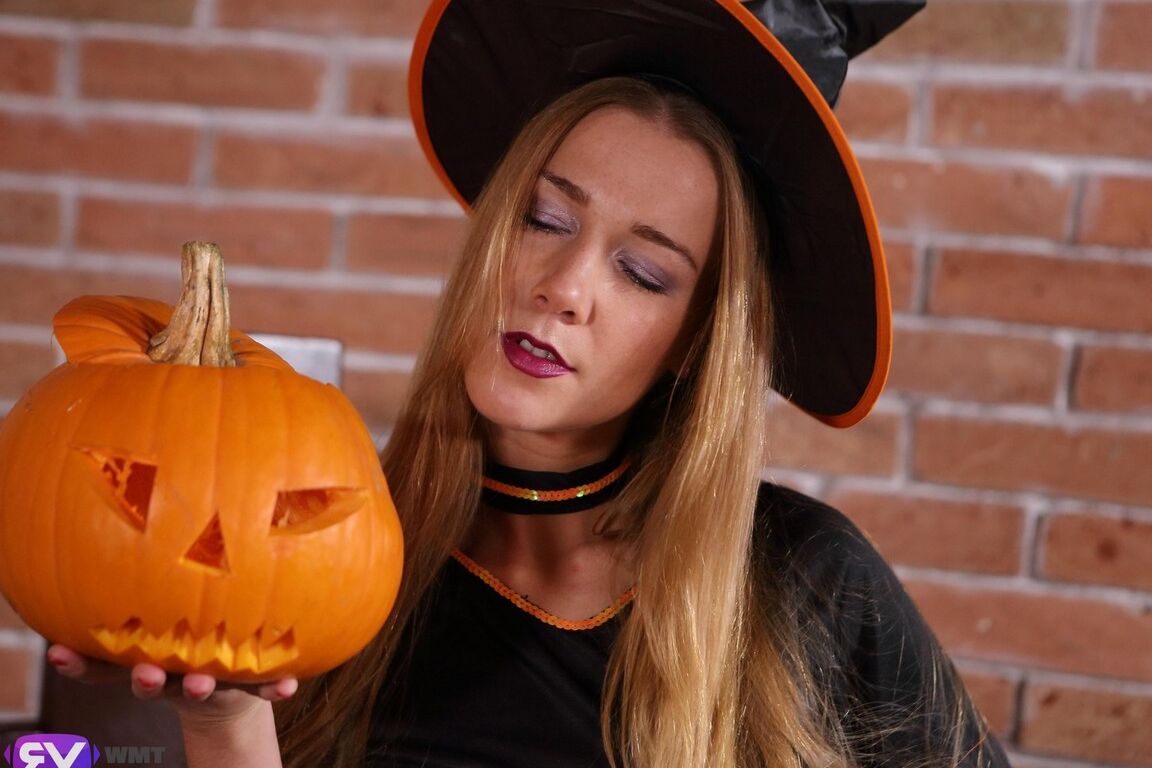 16P Adorable babe in a sexy witch outfit that shows more than covers in VR