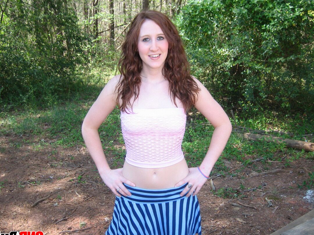 12P Cute redhead Ruby flashes her tits at the park