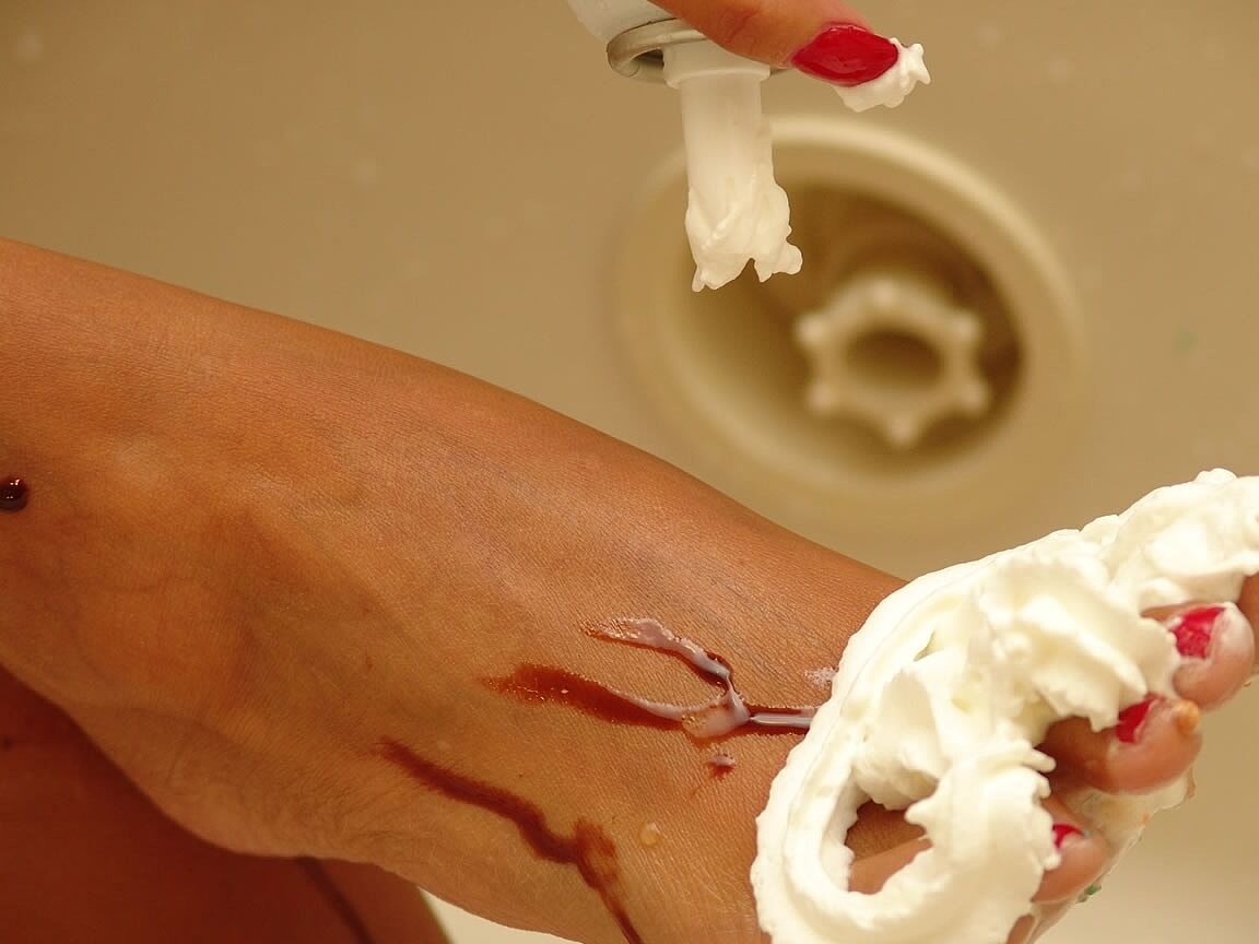 21P Tiny-boobed MILF Lori Anderson	pours chocolate syrup all over her hot body