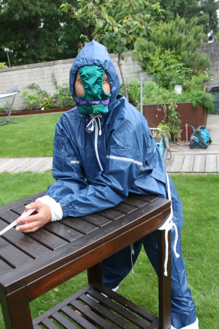 16P Caucasian woman is tied to a table in a yard with panties over her face