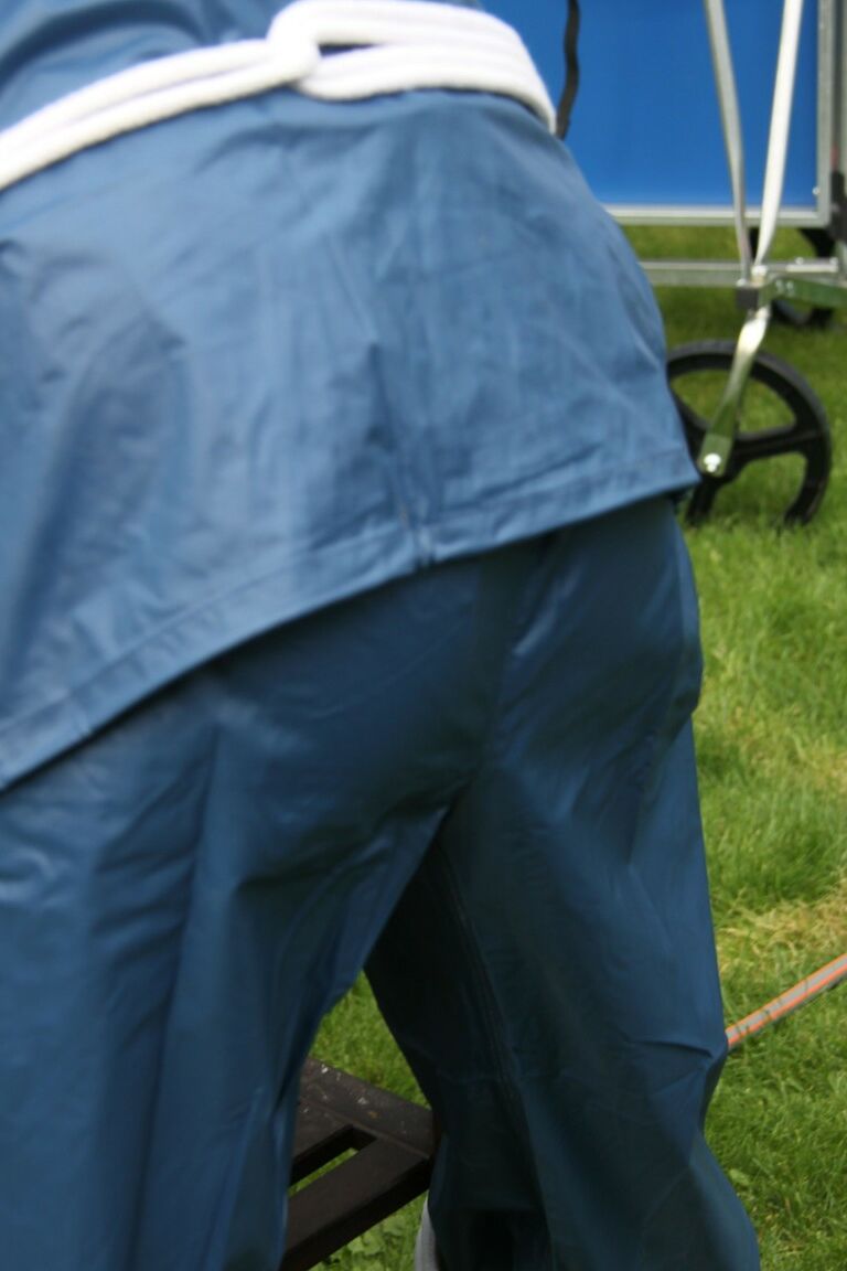 16P Caucasian woman is tied to a table in a yard with panties over her face