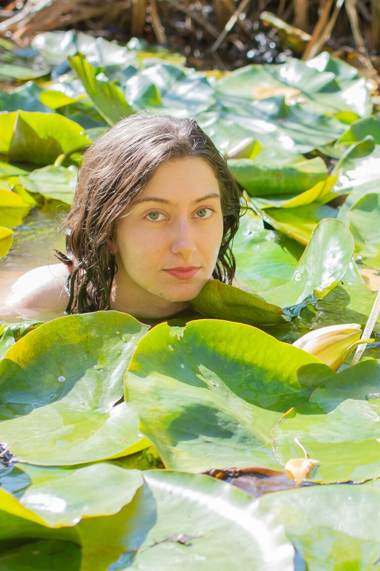 21P Amateur with tiny tits and tattoos Fox flaunts her hairy armpits in a pond