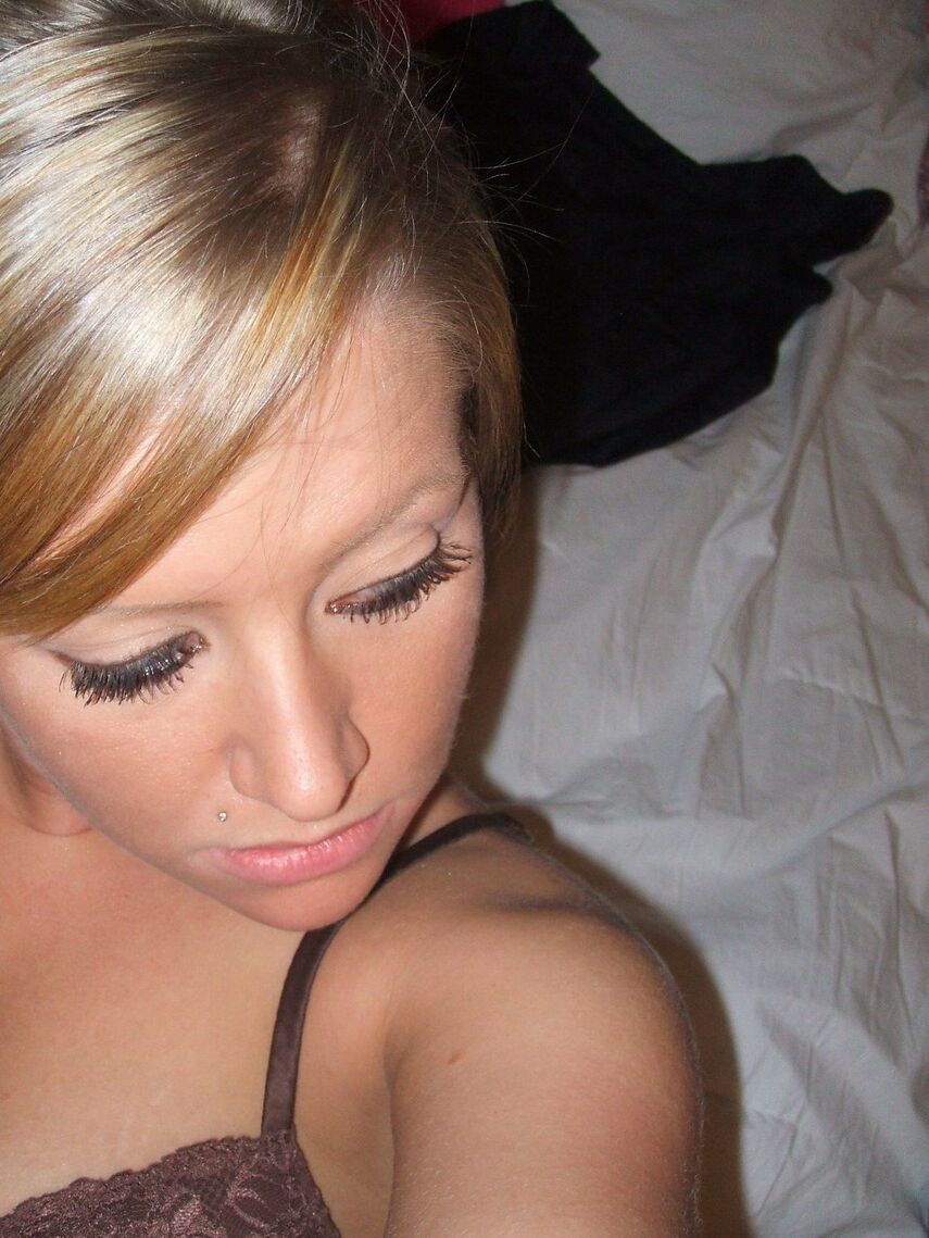 12P Blonde amateur takes self shots while wearing a brassiere and pyjama bottoms