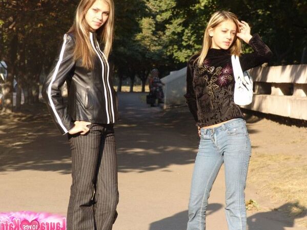 10P Teen lesbians Katrina and Laura hold hands while clothed in public
