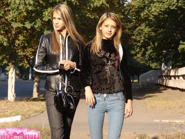 10P Teen lesbians Katrina and Laura hold hands while clothed in public