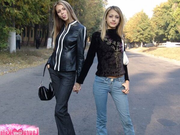 10P Teen lesbians Katrina and Laura hold hands while clothed in public