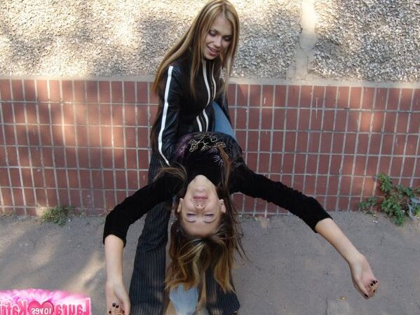 10P Teen lesbians Katrina and Laura hold hands while clothed in public