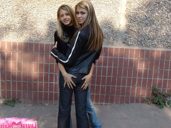 10P Teen lesbians Katrina and Laura hold hands while clothed in public