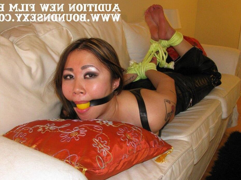 15P Amateur models get gagged and bound before struggling against restraints