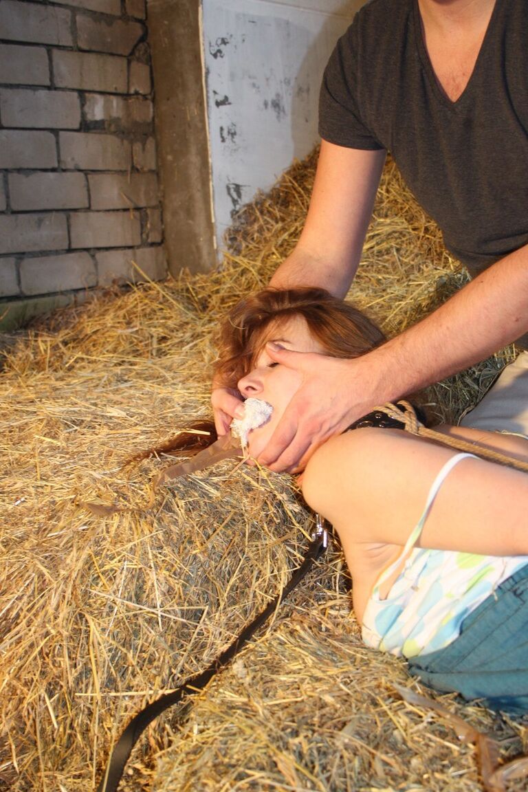 17P Naughty pantiless teen Anouk bound with rope & gagged with tape in the barn