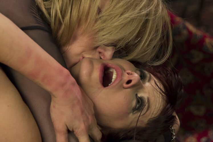 15P Redhead Maitresse Madeline Marlowe submits to Nina Hartley during lezdom play