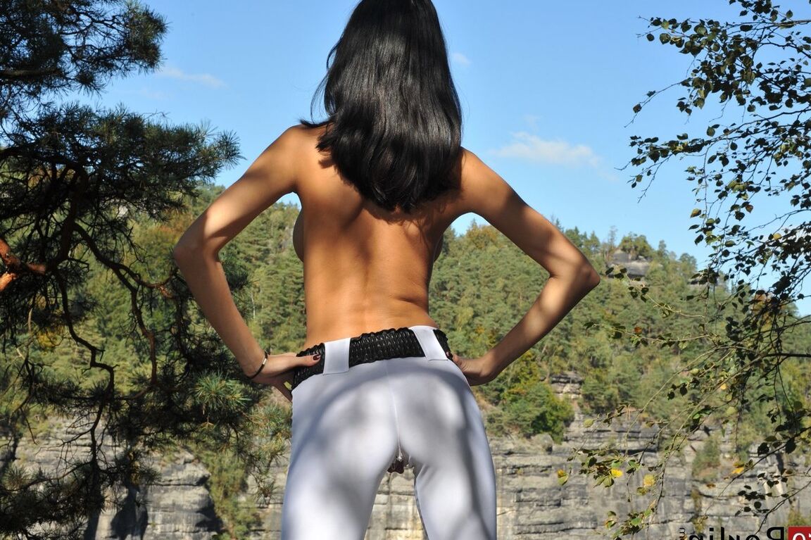 11P Solo model Gabi de Castello plays with her twat outside in crotchless pants