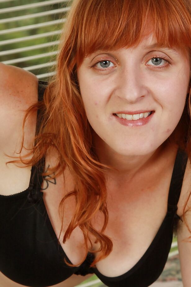 16P Ugly redhead MILF tweaking her nipples and exposing her shaggy twat