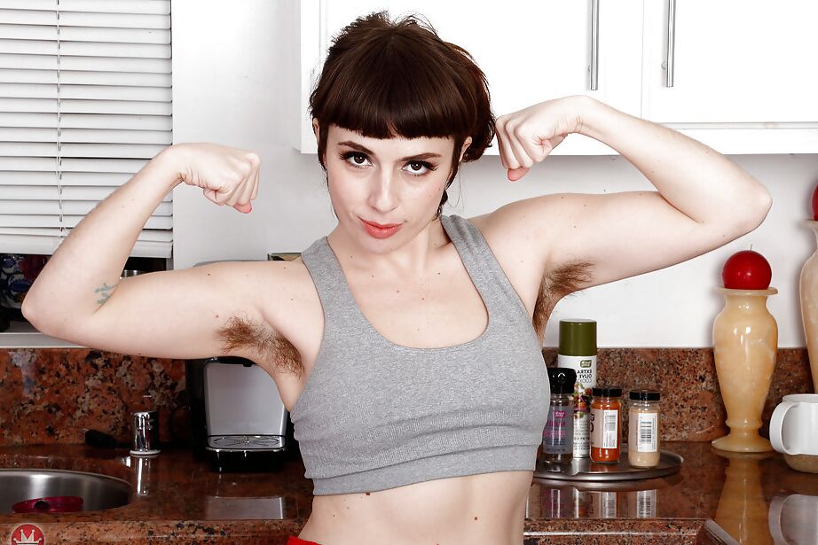16P All natural solo model Simone Delilah displaying hairy body parts in kitchen