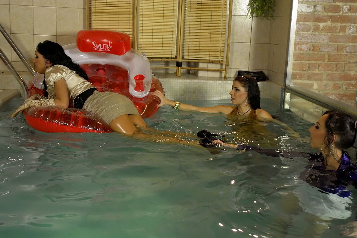 15P Fully clothed females expose tits and twats by jumping into an indoor pool