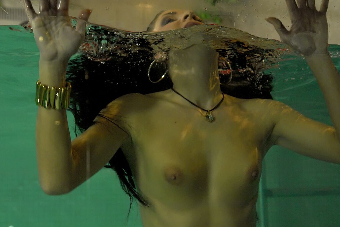 15P Fully clothed females expose tits and twats by jumping into an indoor pool