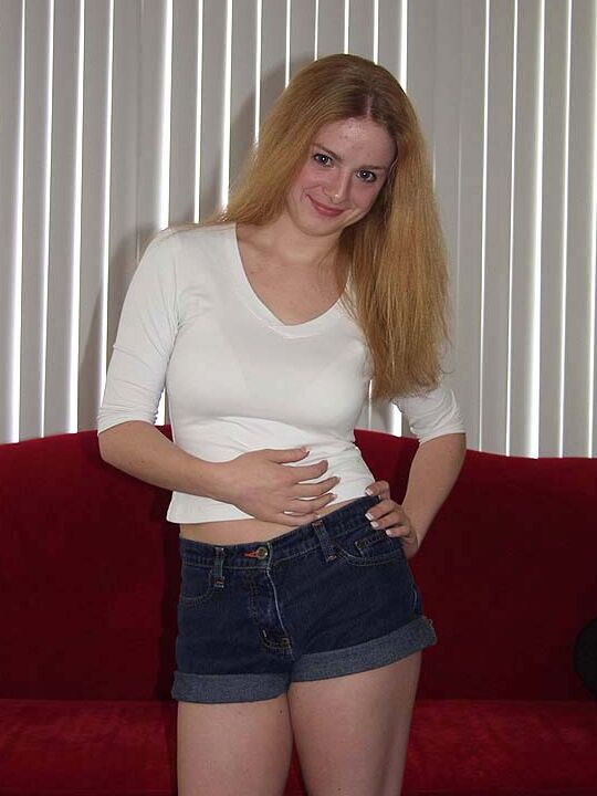 16P Fair skinned redhead Heidi displays her big naturals and twat at the same time