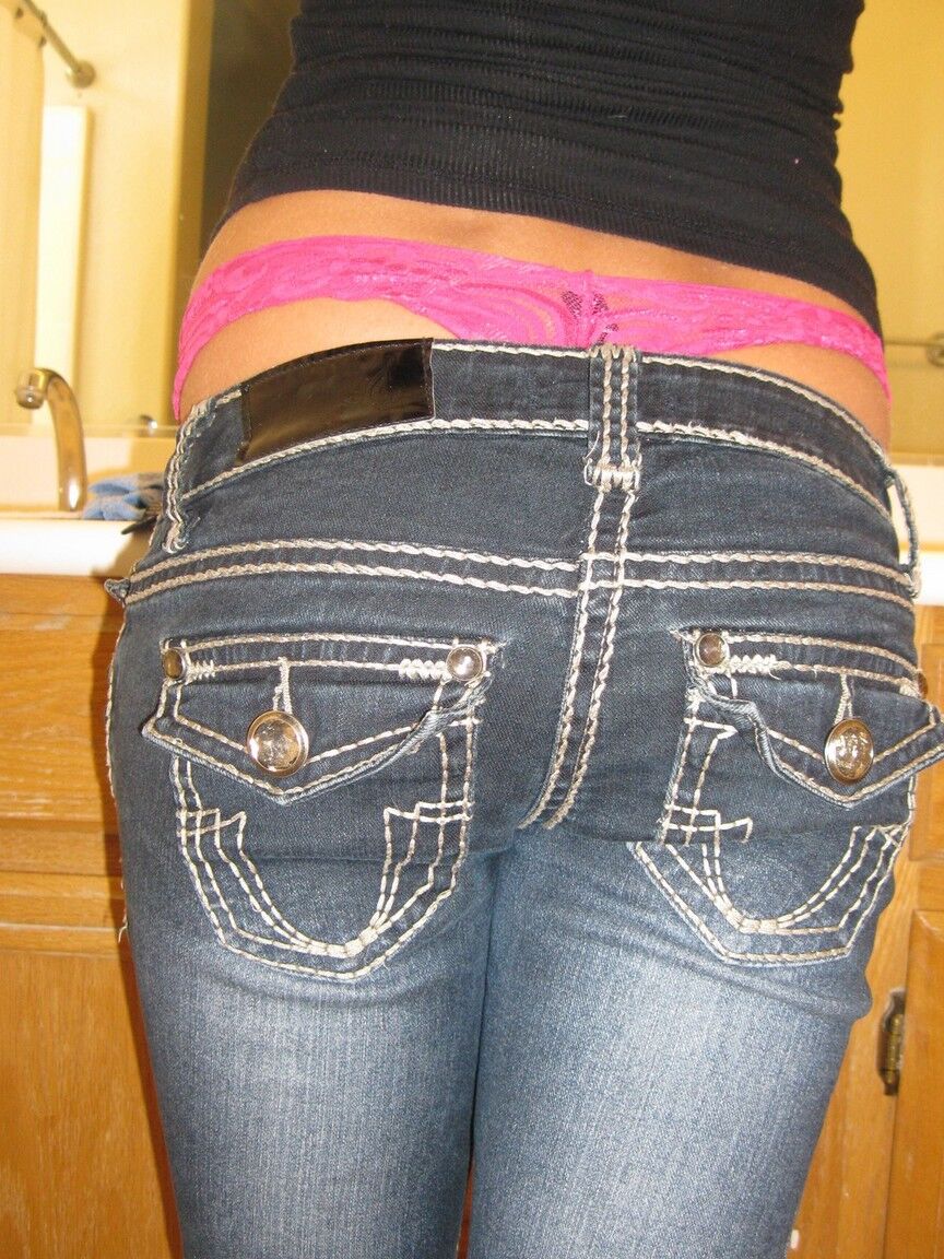 16P Blonde amateur Tiny Tiff sports a whale tail while doing her hair in a mirror