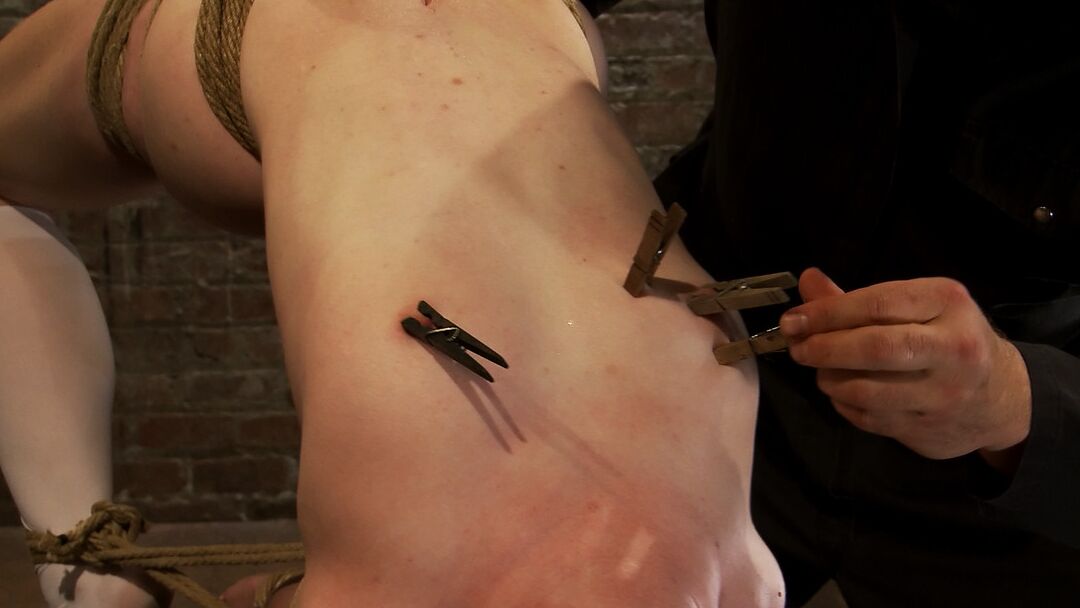21P Skinny blonde chick Nicki Blue gets tortured while hanging from the ceiling