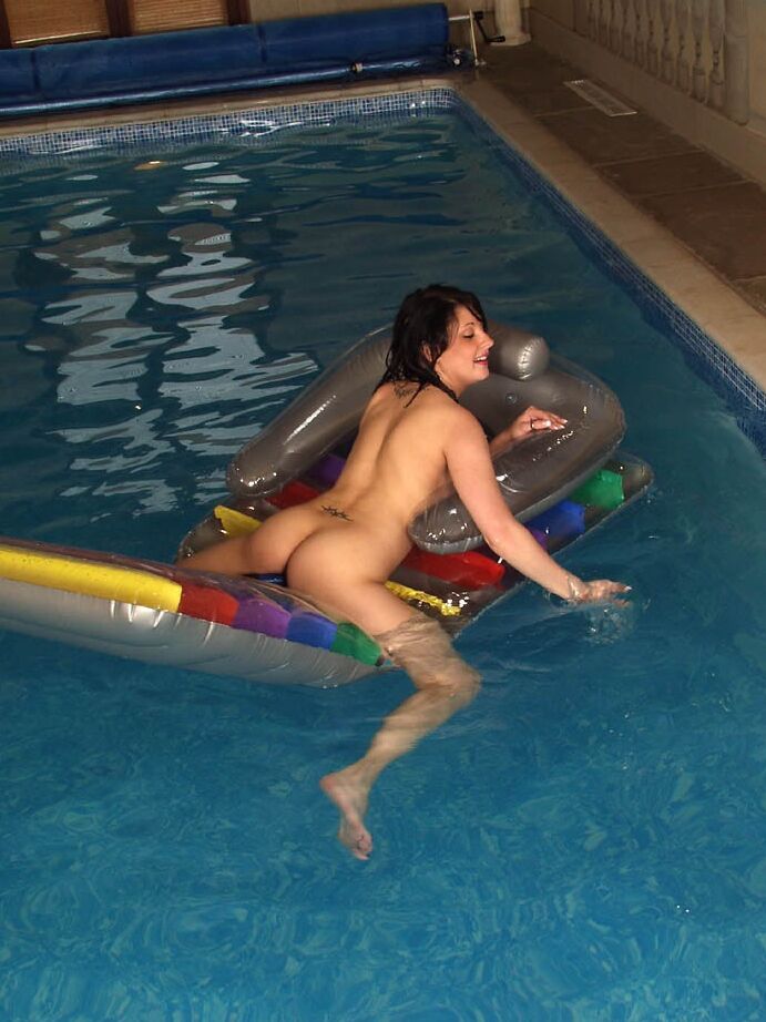 21P Sinful British babe Donna strips her leopard bikini in the pool & masturbates