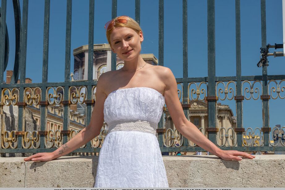 18P Gerda Rubia undresses in the middle of the luscious green grass of the villa
