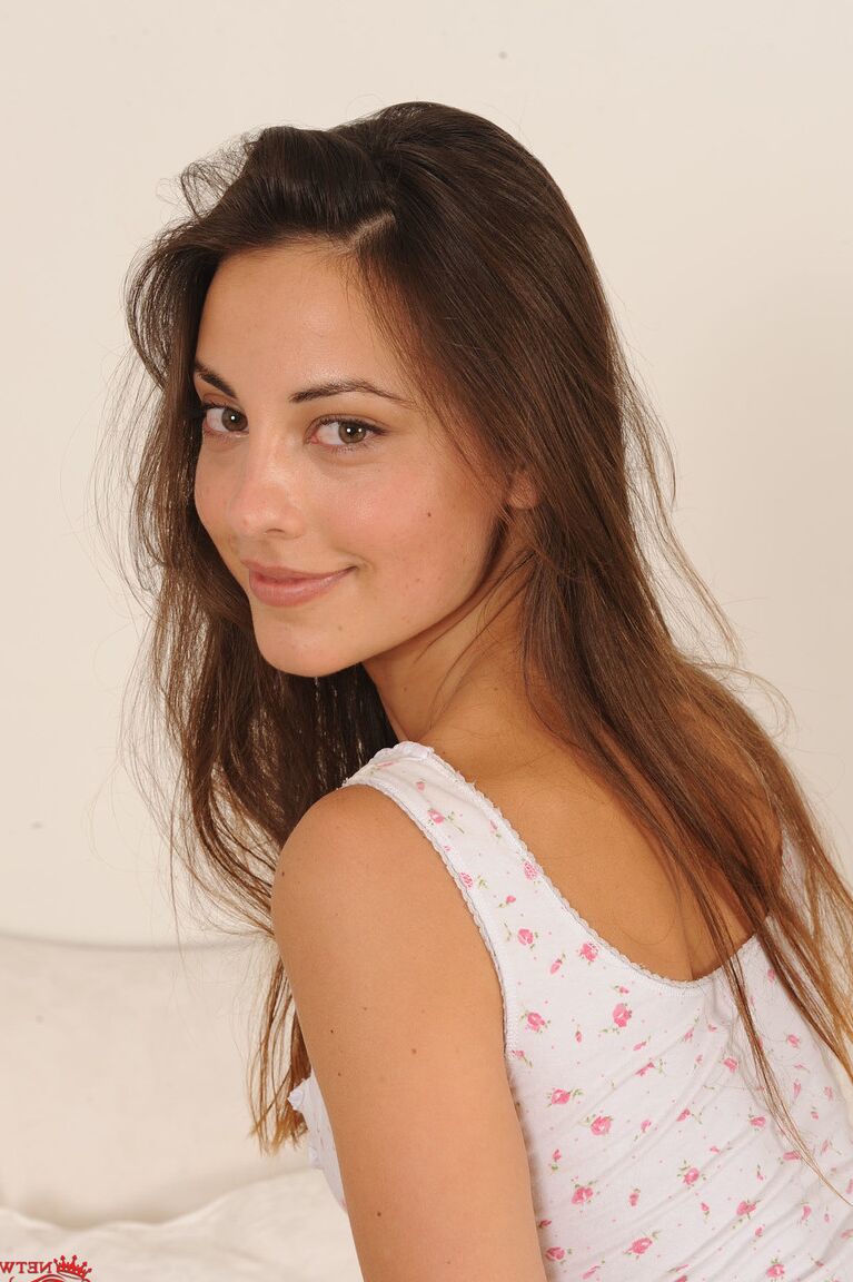 21P Sweet brunette babe Lorena doffs her bodysuit and flaunts her hairy muff