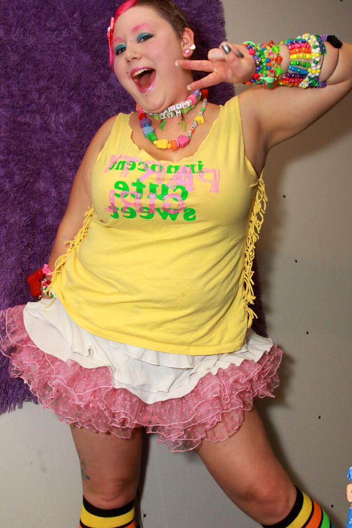 15P Fat girl Tanqueray unleashes her large boobs wearing multi-colored knee socks