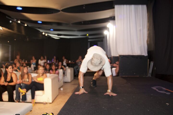 16P Splendid girls have fun with a dancing bear on a wild clothed party