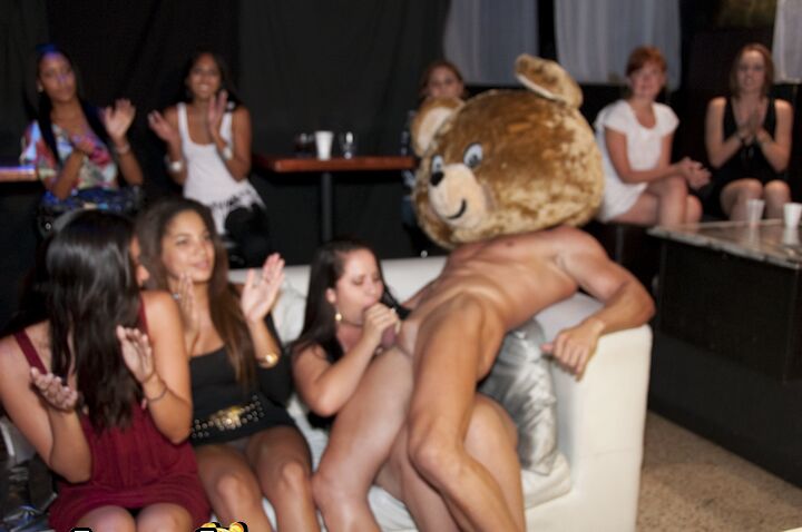 16P Splendid girls have fun with a dancing bear on a wild clothed party