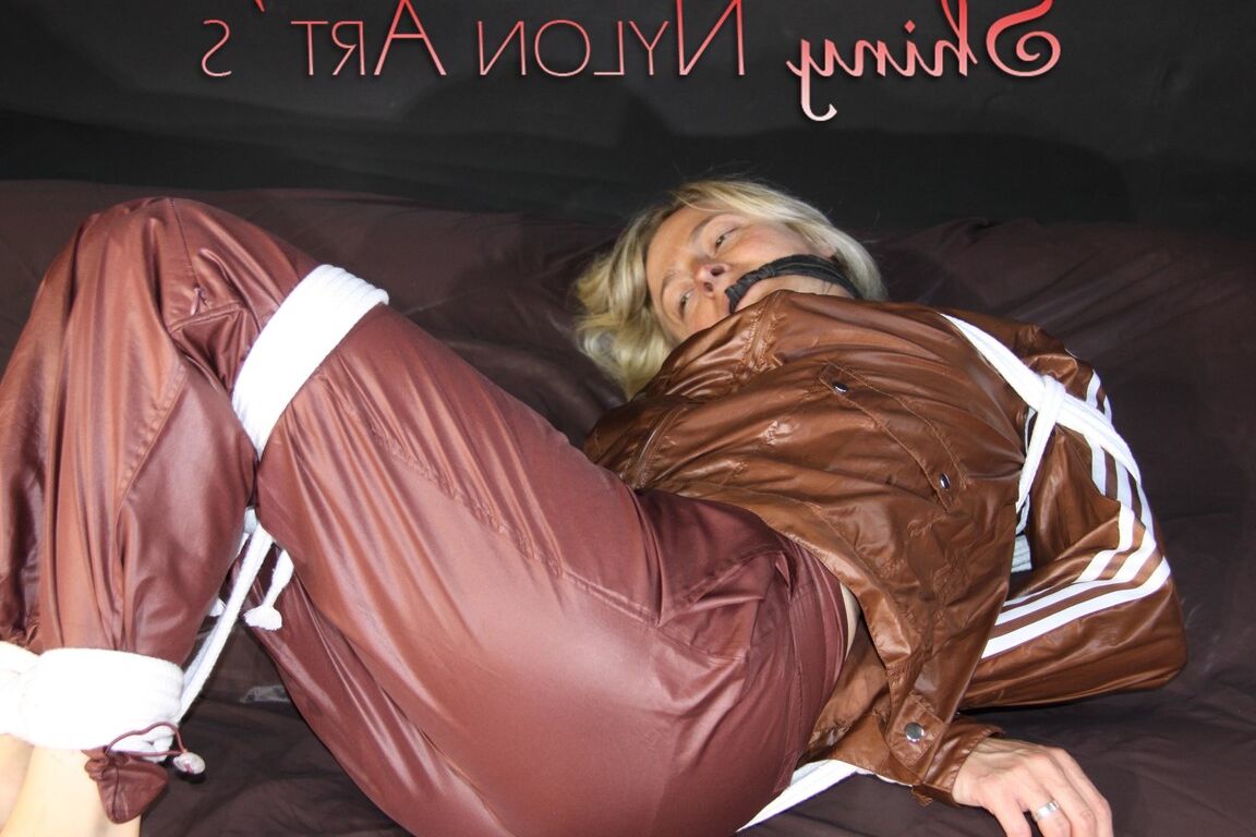 16P Watching sexy Sonja being tied and gagged on a bed with ropes and a clothgag