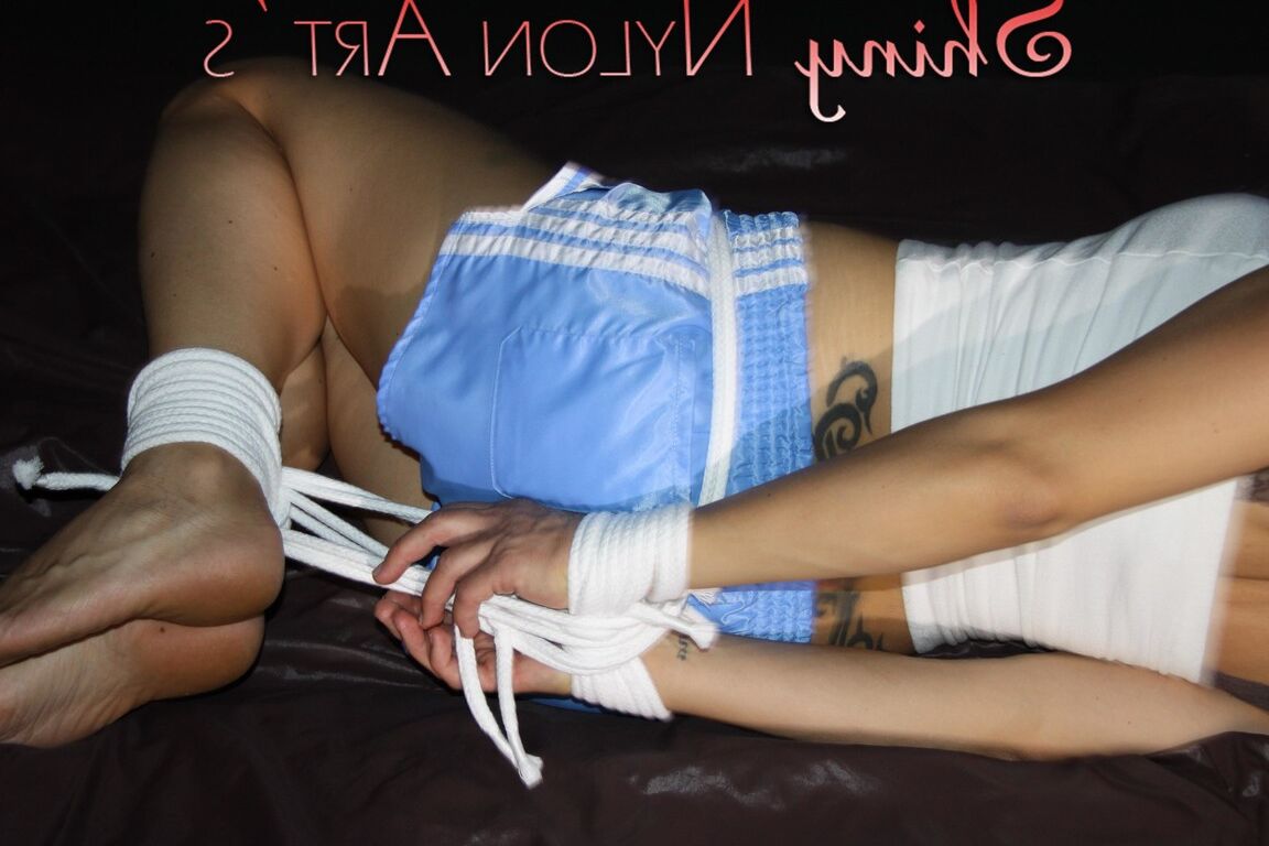16P Sandra being tied and gagged with ropes and a clothgag on a bed wearing a sexy