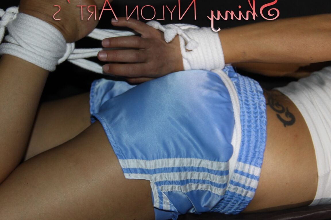 16P Sandra being tied and gagged with ropes and a clothgag on a bed wearing a sexy