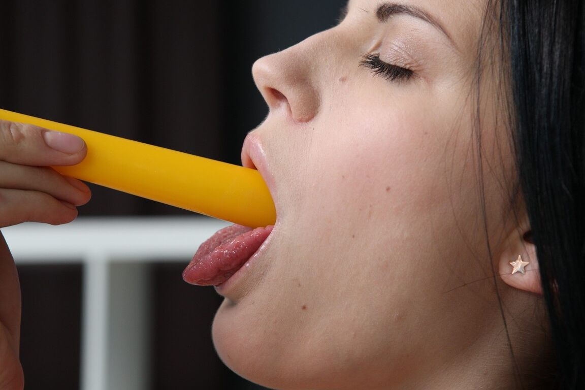 21P Raven-haired model Mia screws her holes with different toys in a solo