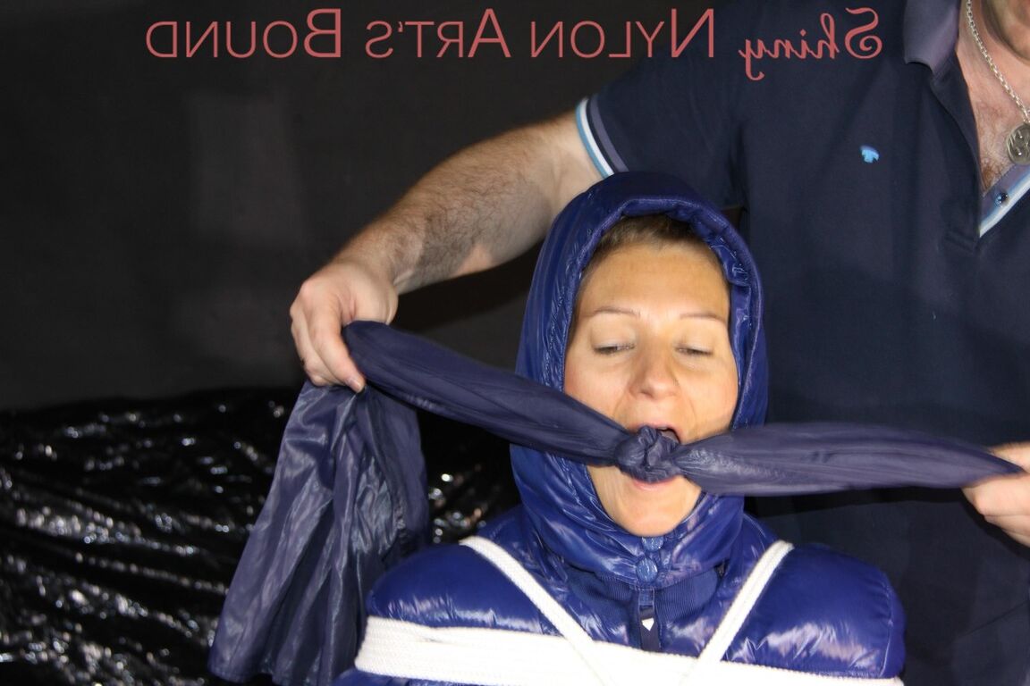 16P Sexy Sandra being tied and gagged with ropes and a clothgag on a chair wearing