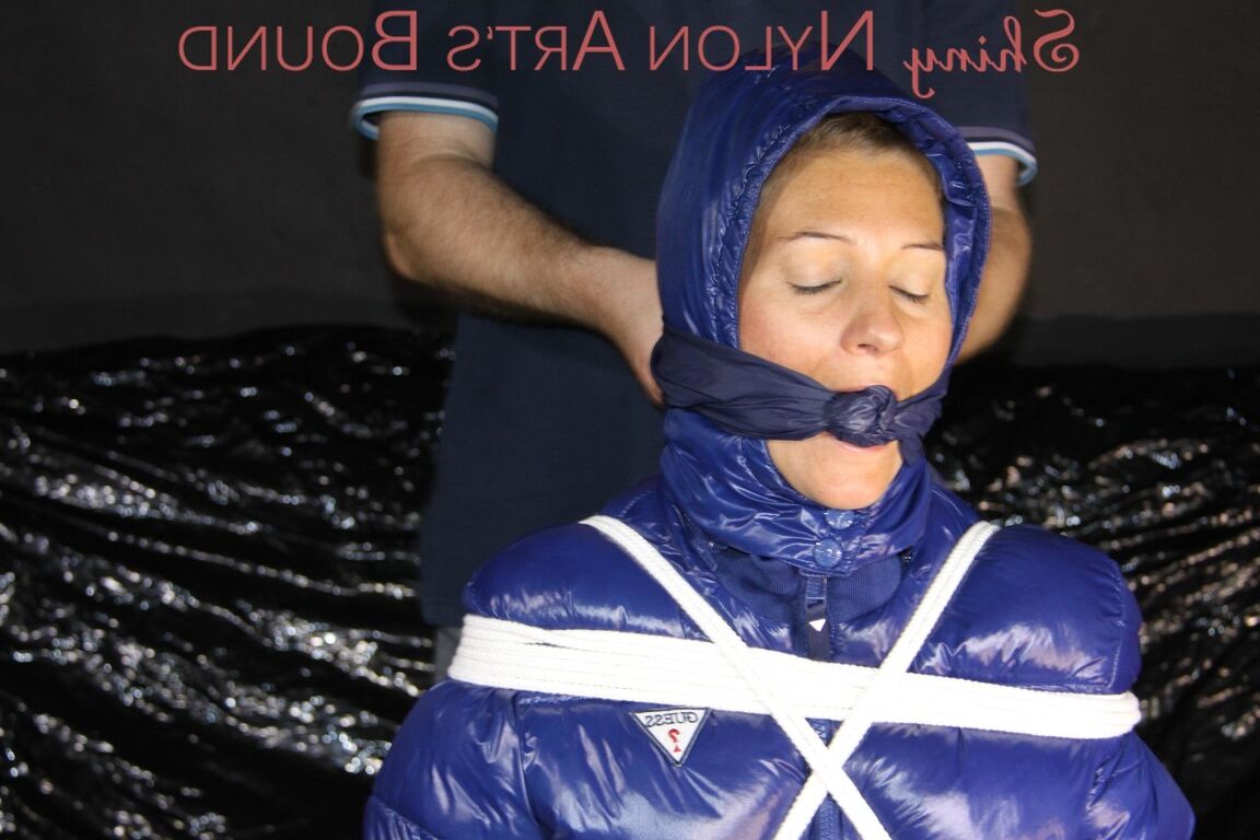16P Sexy Sandra being tied and gagged with ropes and a clothgag on a chair wearing