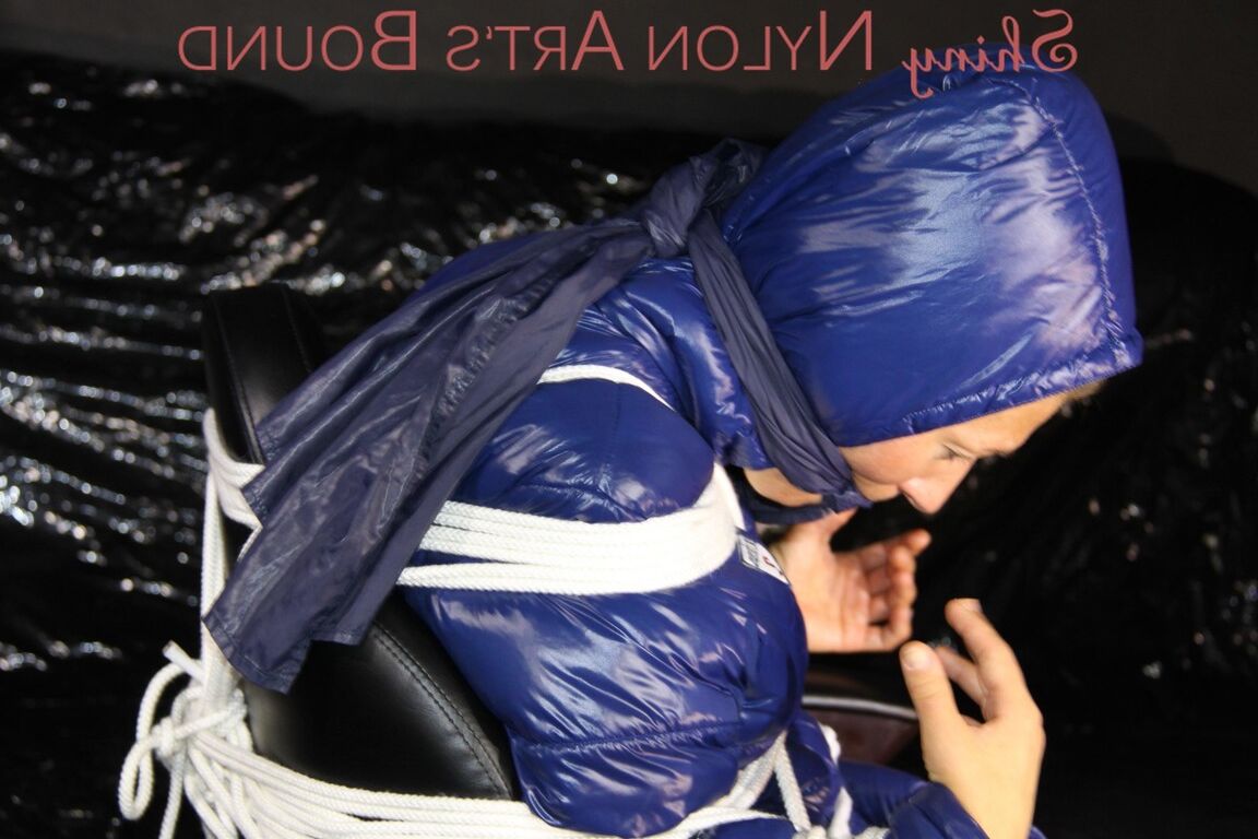 16P Sexy Sandra being tied and gagged with ropes and a clothgag on a chair wearing