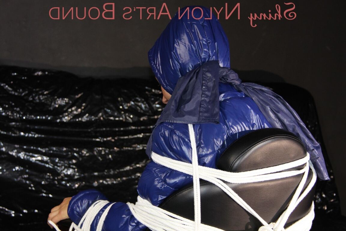 16P Sexy Sandra being tied and gagged with ropes and a clothgag on a chair wearing