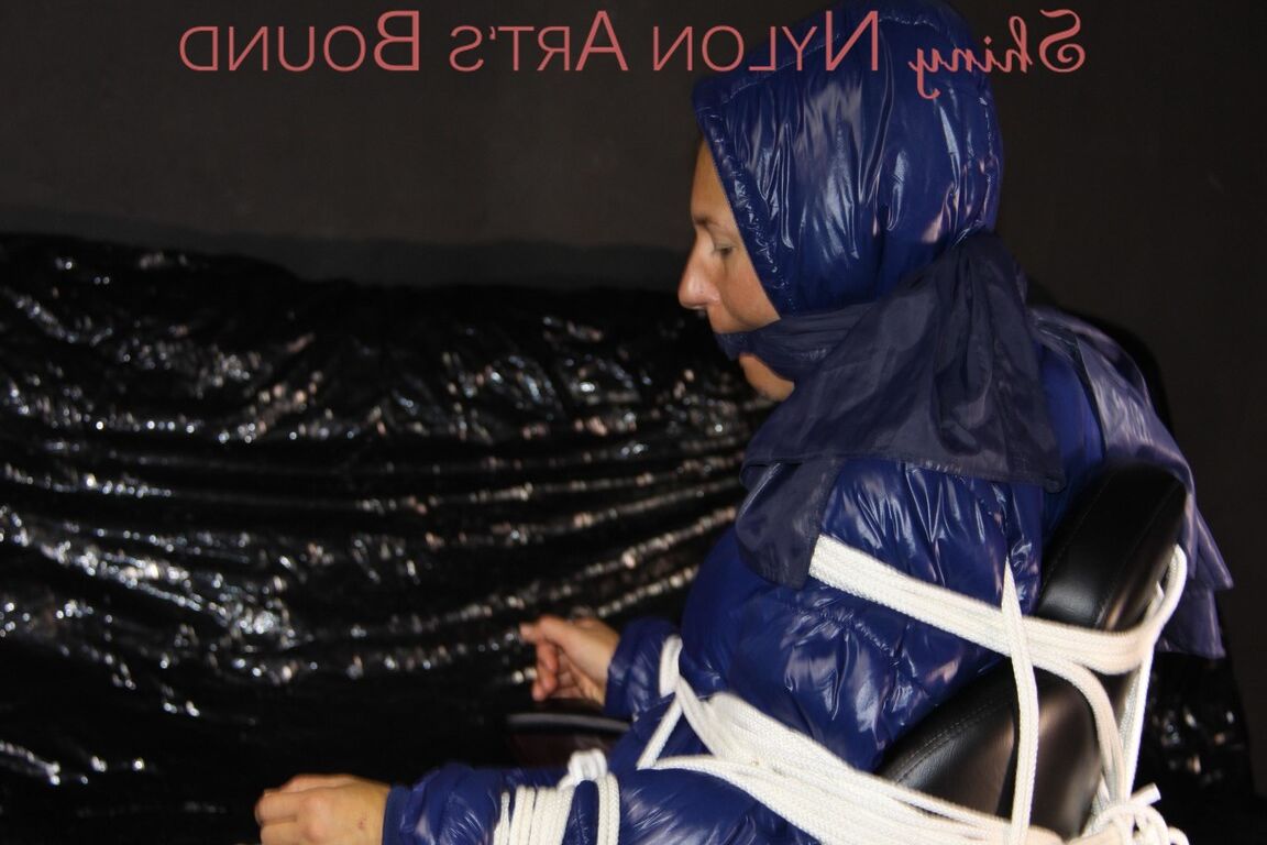 16P Sexy Sandra being tied and gagged with ropes and a clothgag on a chair wearing