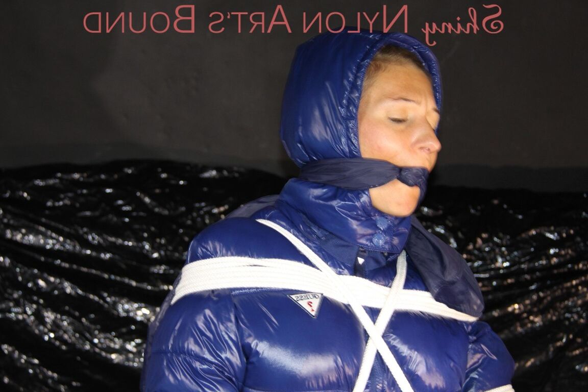16P Sexy Sandra being tied and gagged with ropes and a clothgag on a chair wearing
