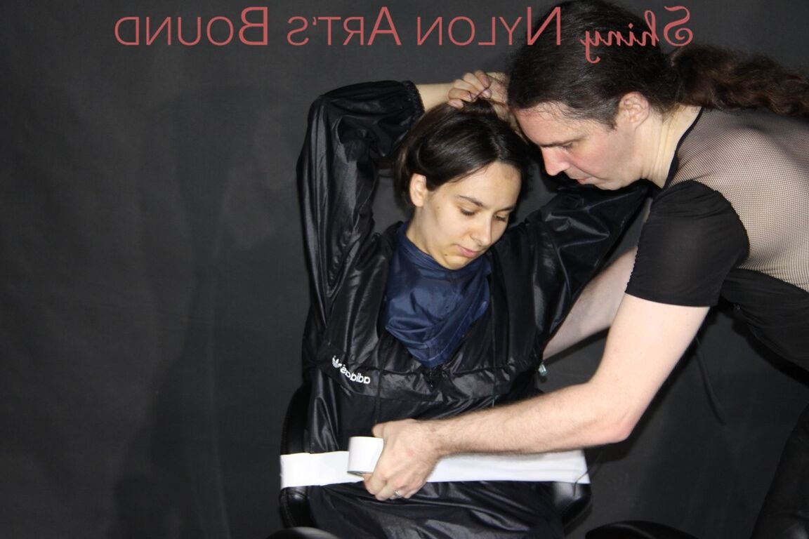 16P Watching our new model AIYANA wearing sexy shiny nylon rainwear being bound