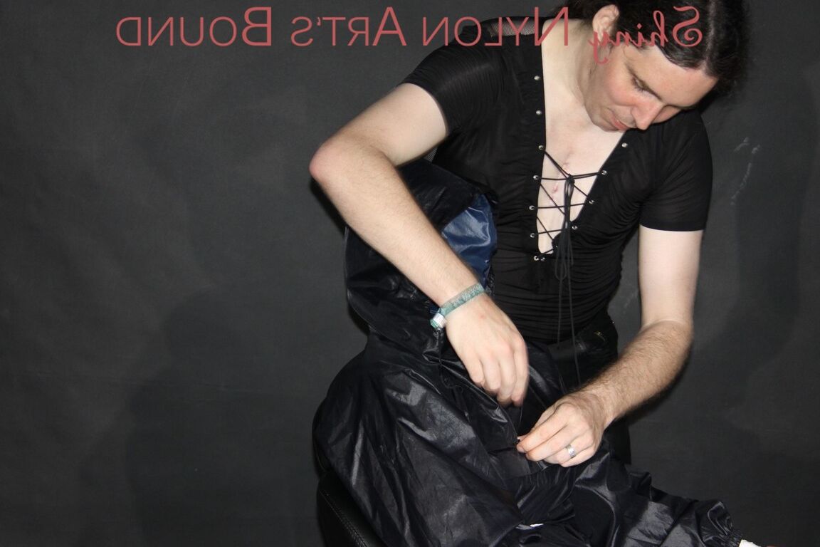 16P Watching our new model AIYANA wearing sexy shiny nylon rainwear being bound