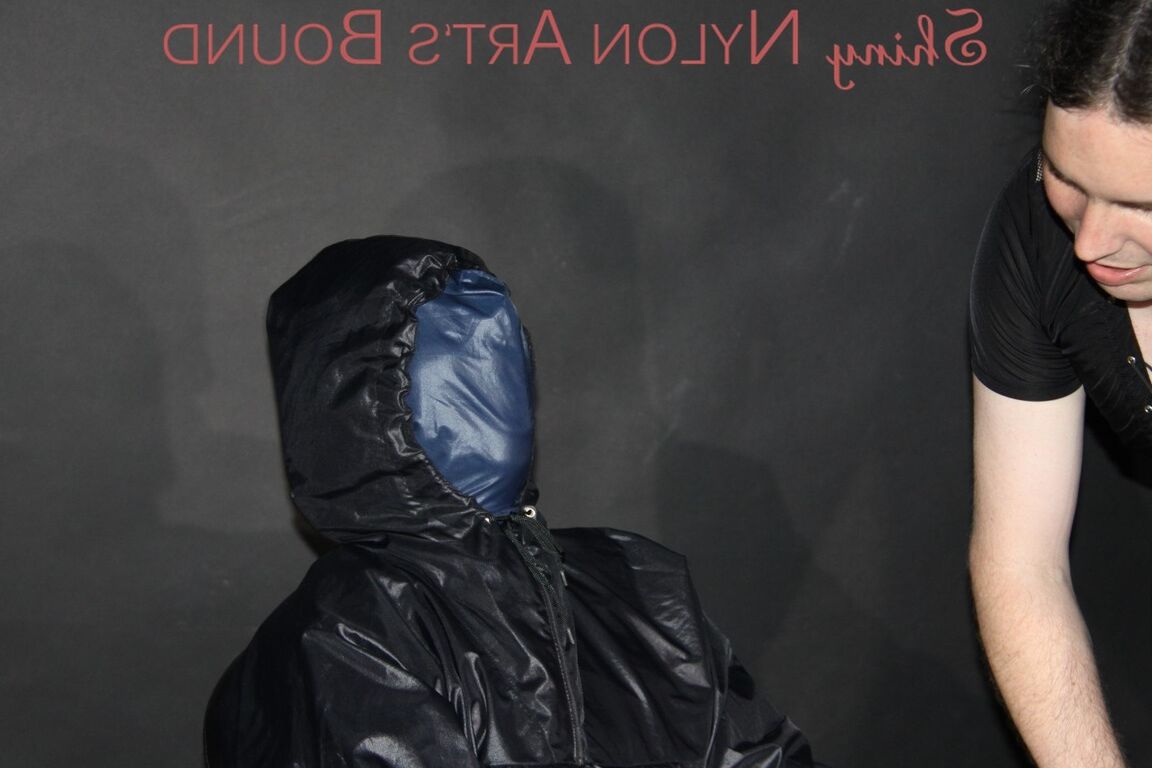 16P Watching our new model AIYANA wearing sexy shiny nylon rainwear being bound