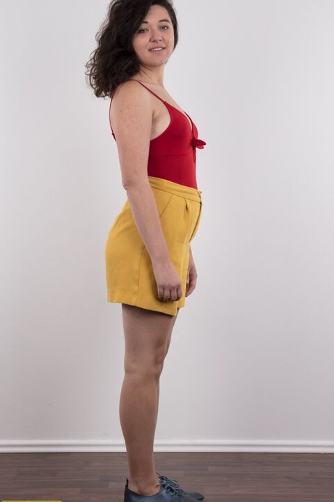16P Plump first timer Anna stands fully clothed and then bare naked as well