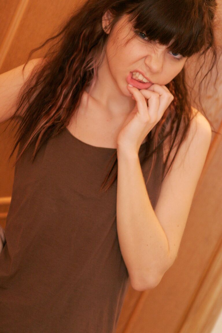 15P Thin teen Kaira 18 strips naked in front of a mirror after a phone call
