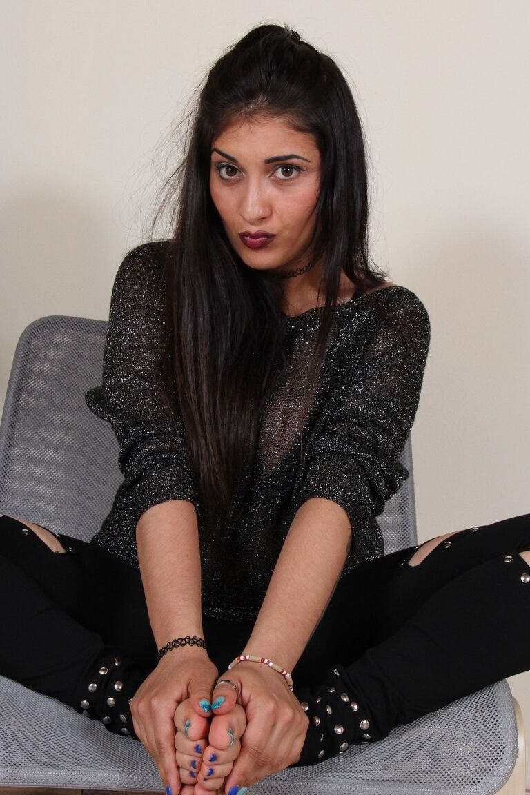 12P Gorgerous brunette shows her perfect bare feet