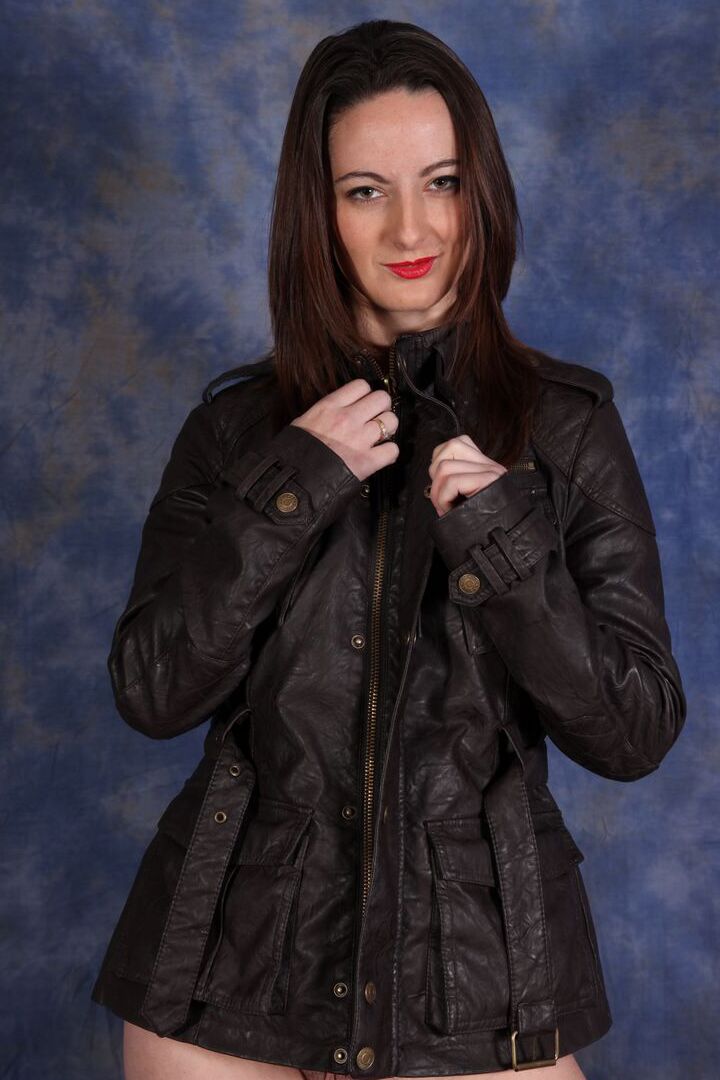 15P Bottomless female works clear of black leather jacket during solo action